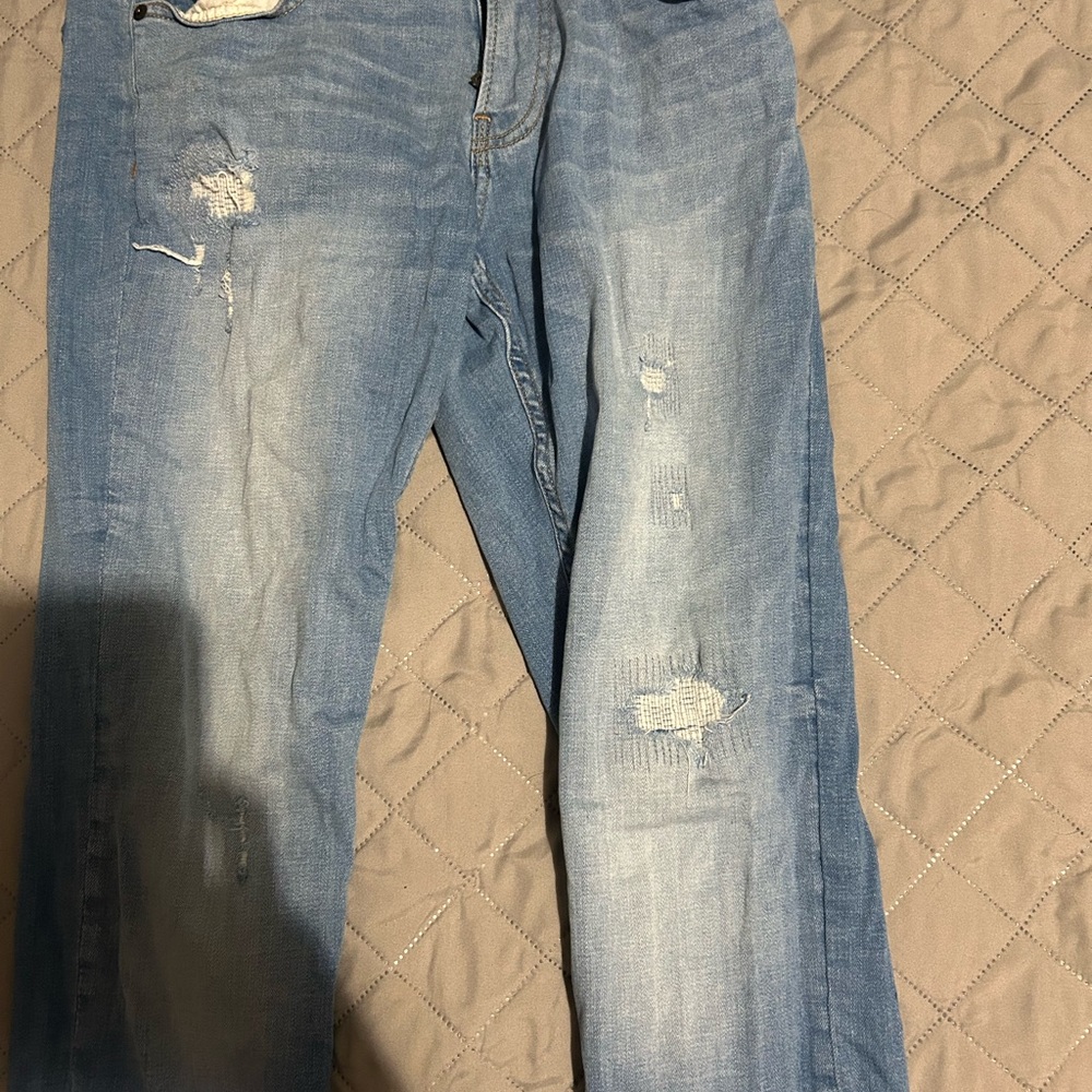 Distressed Blue Jeans